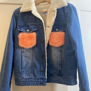 SJYP denim jacket with pink faux fur
